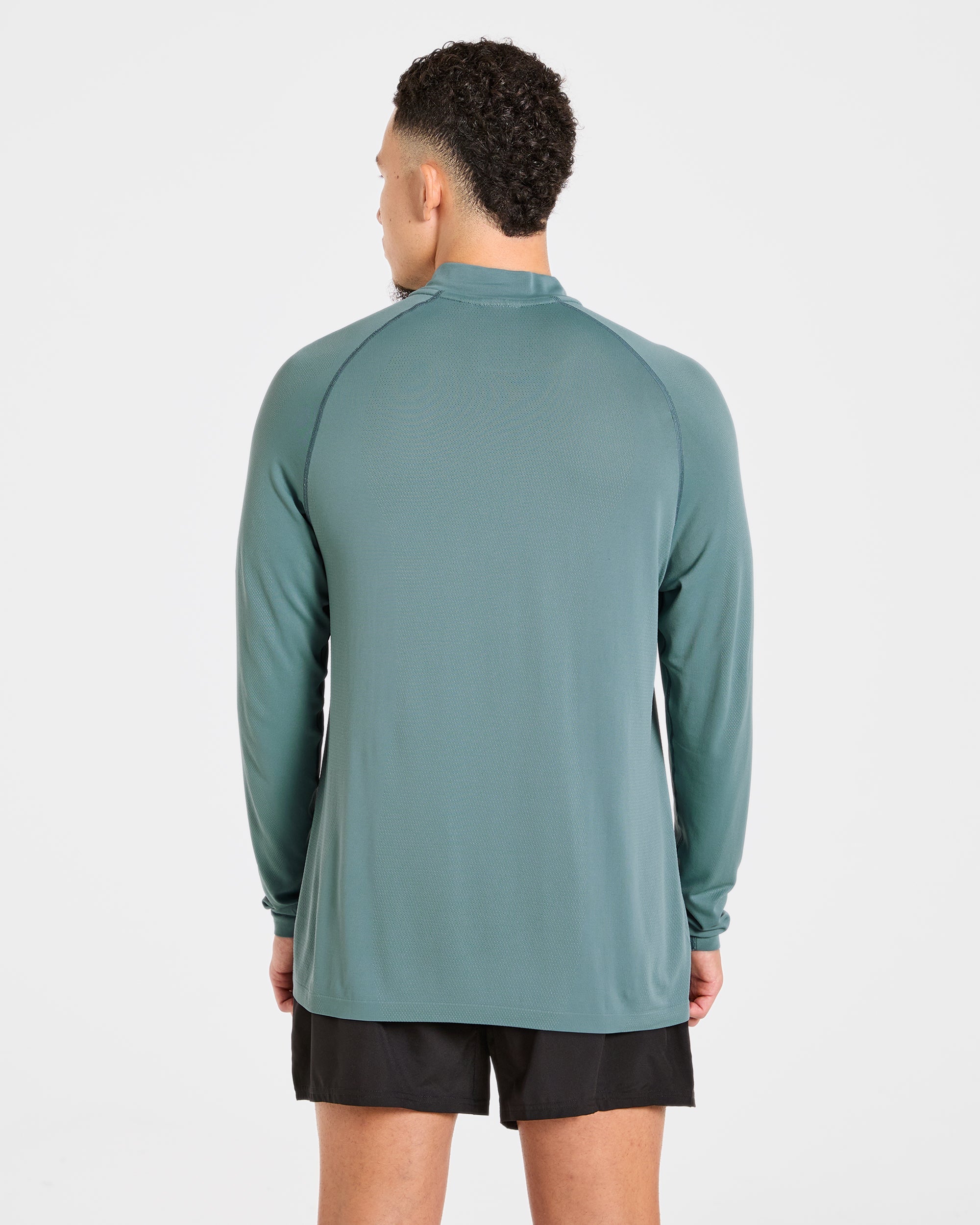 Attain Seamless 1/2 Zip Pullover - Titan Bleu