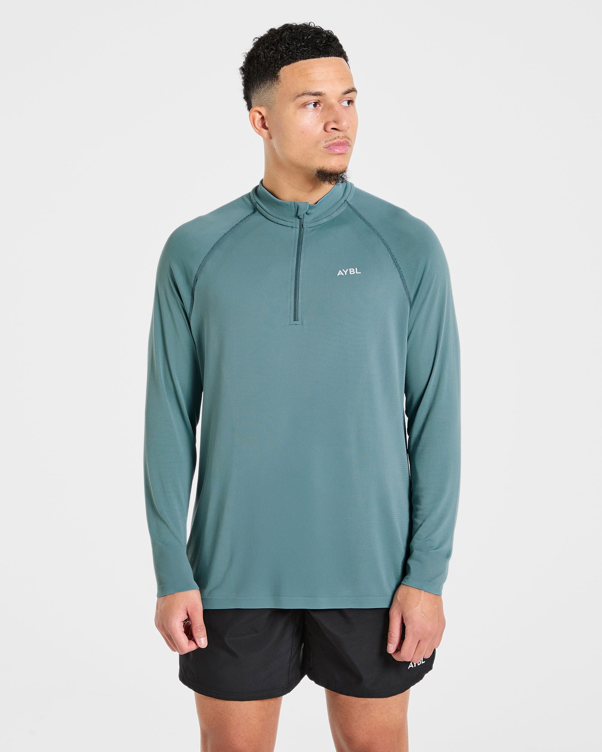 Attain Seamless 1/2 Zip Pullover - Titan Bleu