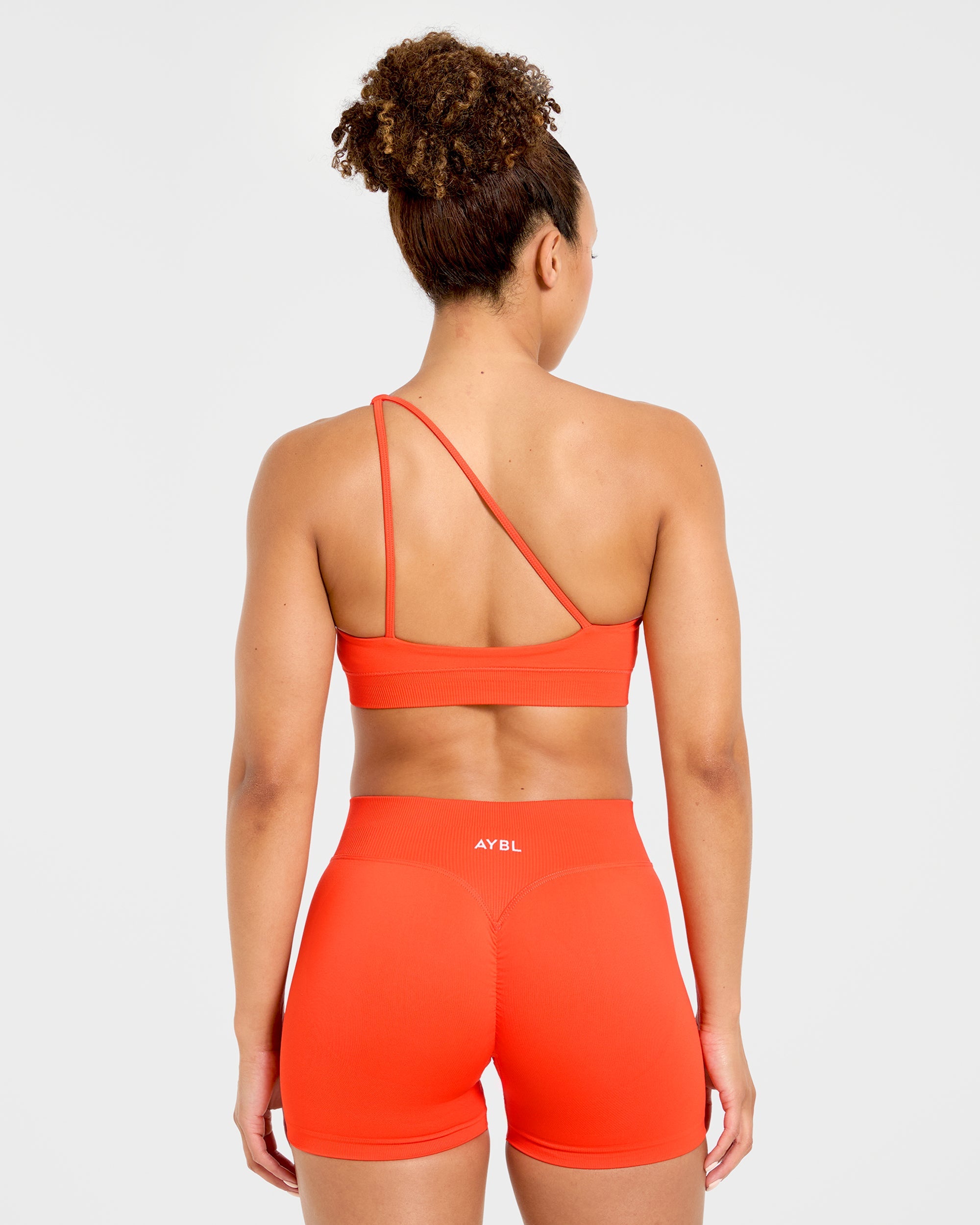 Enhance Seamless One Shoulder Sports Bra - Summer Orange