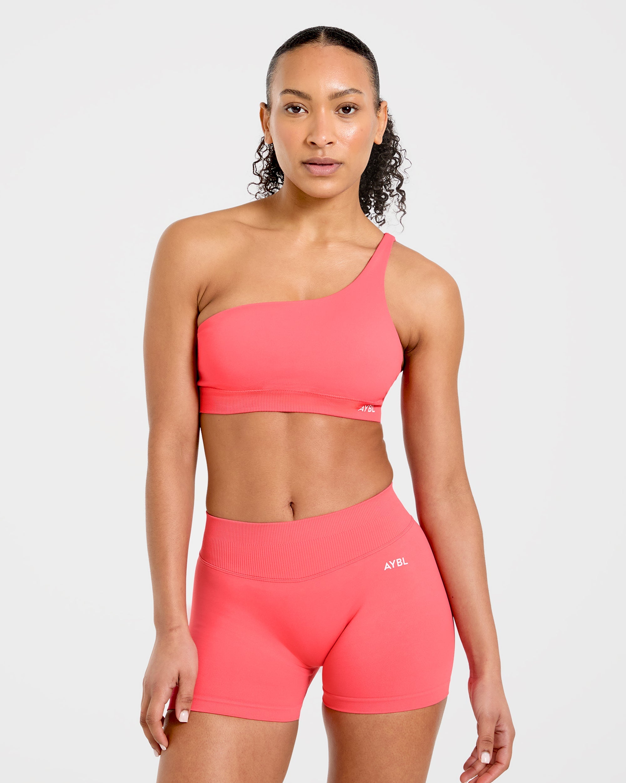 Enhance Seamless One Shoulder Sports Bra - Summer Coral