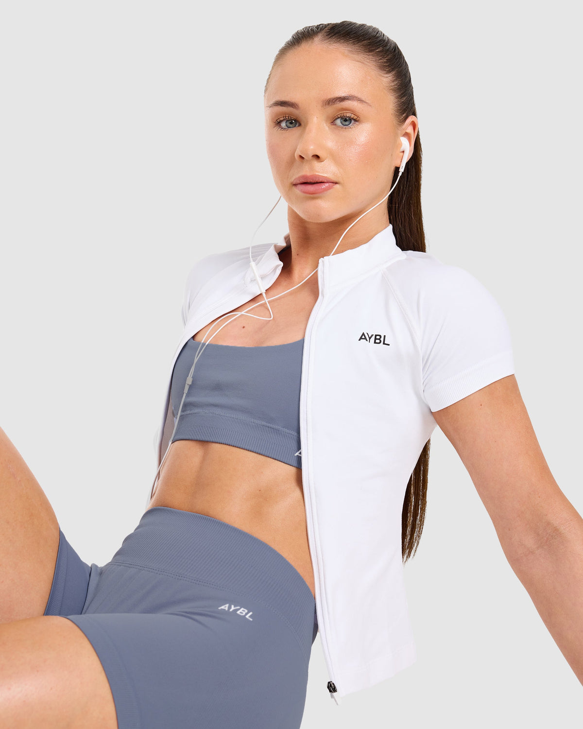 Enhance Seamless Short Sleeve Zip Up Jacket - Blanc