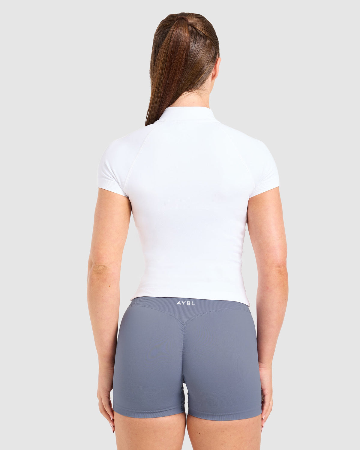 Enhance Seamless Short Sleeve Zip Up Jacket - Blanc