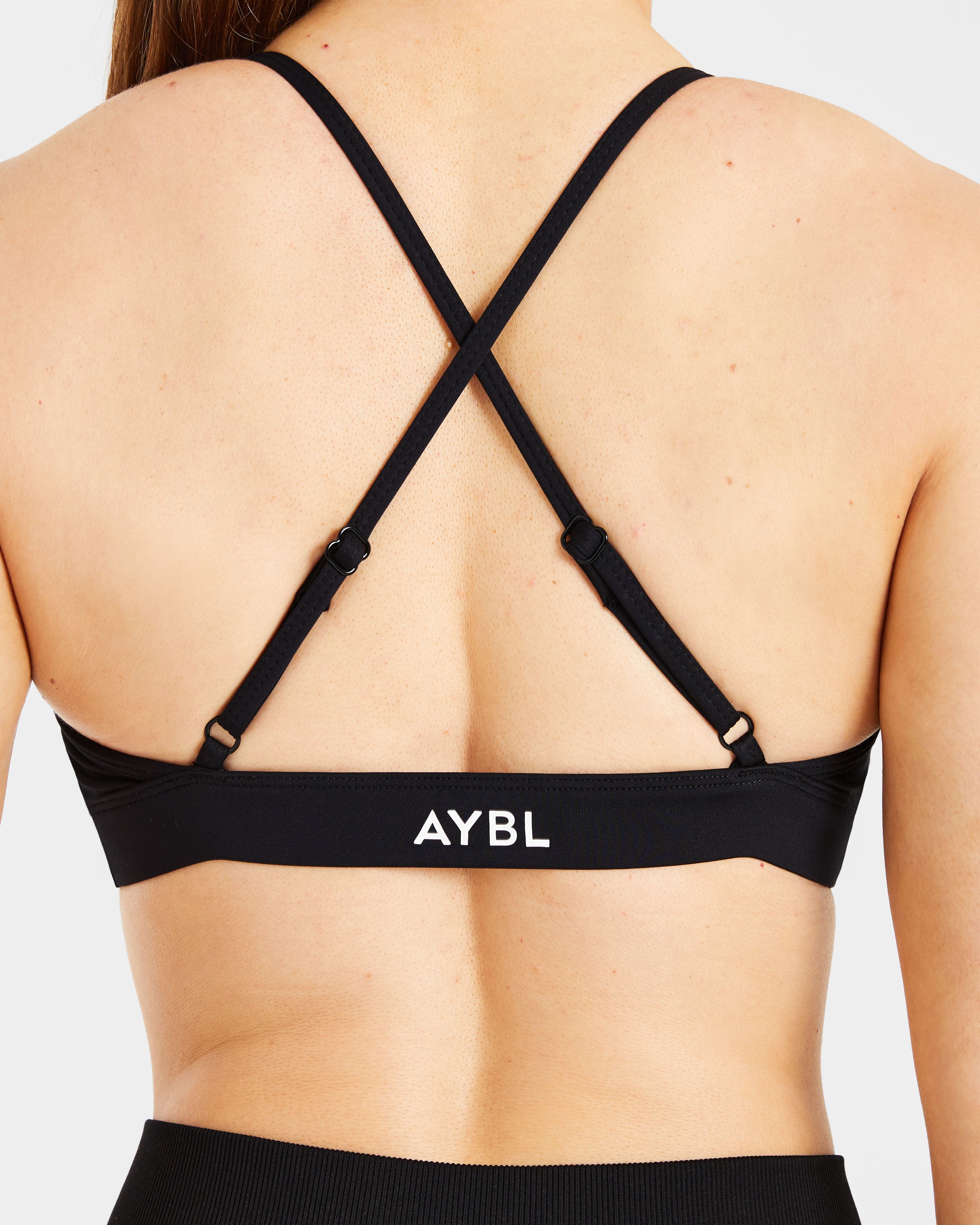 Essential Twist Crossback Sports Bra - Noir